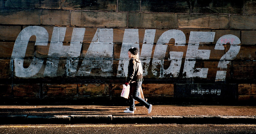 person walking down street