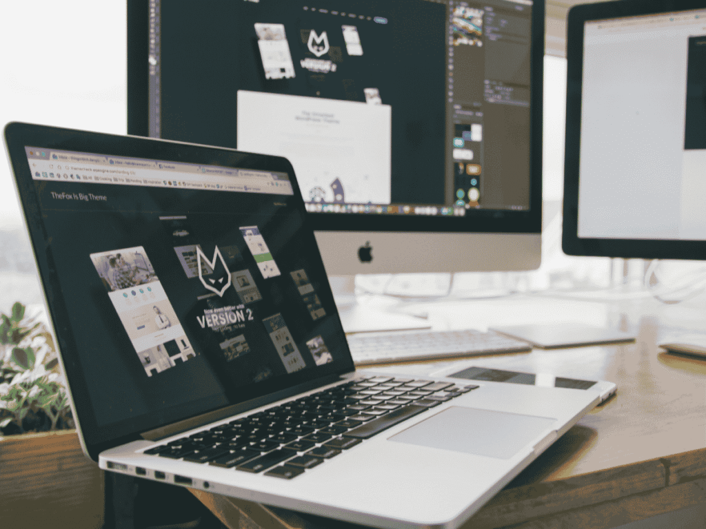 Laptop sitting on a desk / The most important parts of a homepage are crucial.