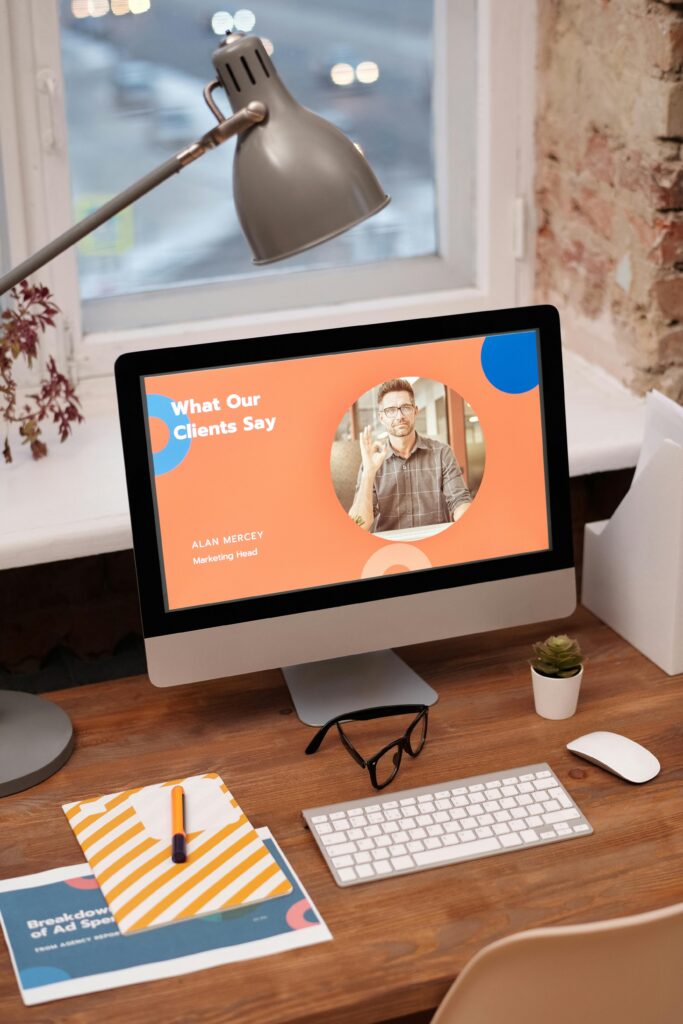Brand Consistency Is Worth 33% More Revenue 6 iMac screen, keyboard, mouse and light on a table