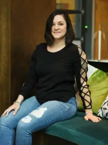 a woman sitting on a couch
